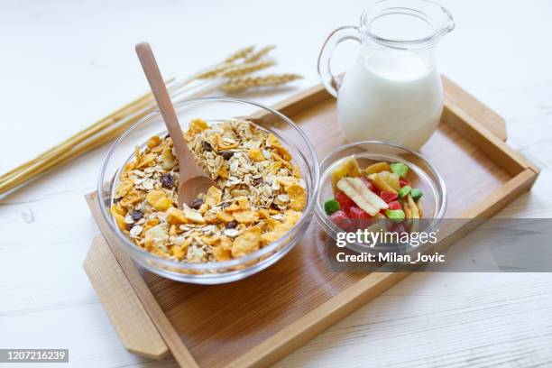 granola breakfast with dried fruits - wholegrain stock pictures, royalty-free photos & images