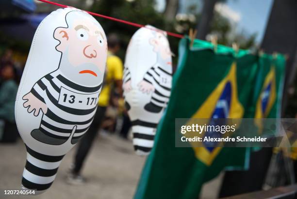 People participate in a demonstration on Avenida Paulista in favor of President Jair Bolsonaro amid the coronavirus outbreak March 15, 2020 in São...