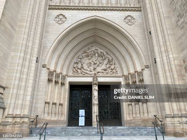Closed" sign is viewed at the Washington National Cathedral on March 15, 2020 in Washington, DC. - Episcopal churches in the District and the...
