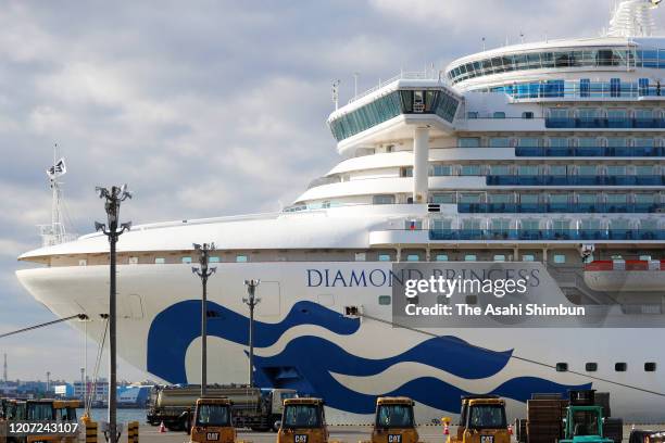 The Diamond Princess cruise ship which is anchored at Daikoku Pier of the Yokohama Port is seen prior to quarantined passengers disembark on February...