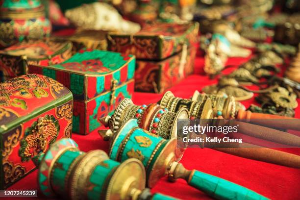 mani prayer wheels for sale - thimphu bhutan stock pictures, royalty-free photos & images