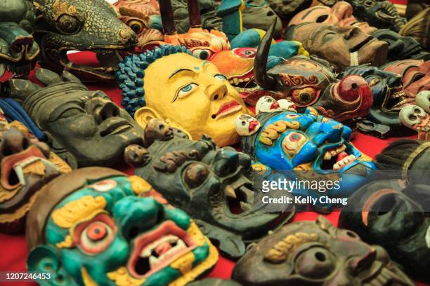 handcrafted wooden masks for sale - thimphu stock pictures, royalty-free photos & images