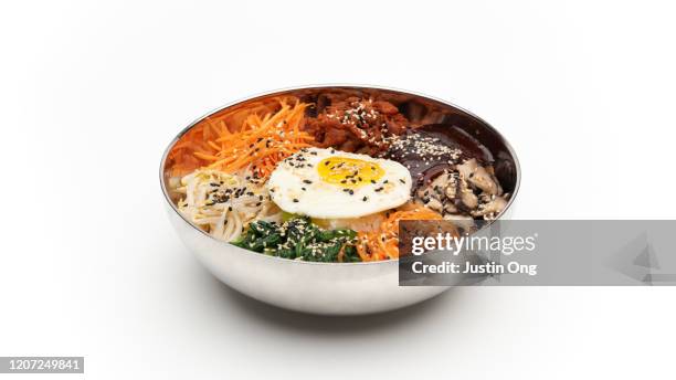 korean mixed rice bibimbap - korean food stock pictures, royalty-free photos & images
