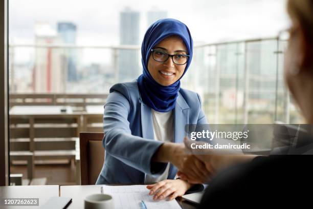 business meeting - islamic finance stock pictures, royalty-free photos & images