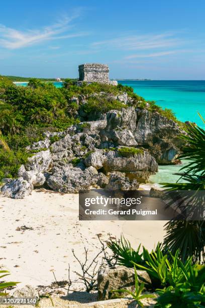god of winds (dios del viento) temple in a sunny day. ruins of tulum, a pre-columbian mayan walled city in yucatán peninsula on the caribbean sea in the state of quintana roo, mexico. - tulum mexico stock pictures, royalty-free photos & images