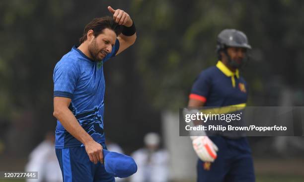 Shahid Afridi of Multan Sultans reacts as Kumar Sangakkara of the MCC looks on during the T20 match between Multan Sultans and the MCC at Aitchison...