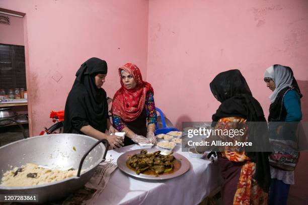 Runa Lila, Zubaida, Banu and Dalia package food on January 20, 2020 in Dhaka, Bangladesh. Zubaida returned from Saudi Arabia in 2019. "My financial...