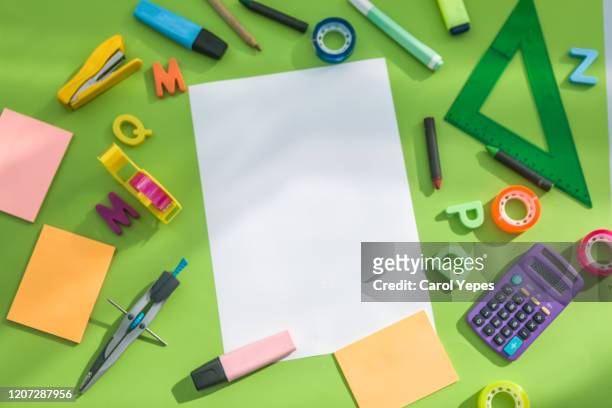 top view blank empty sheet and school supplies - blank book on desk stock-fotos und bilder