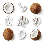 Set of fresh whole and half coconut and slices