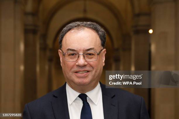 Bank of England Governor Andrew Bailey poses for a photograph on the first day of his new role at the central bank on March 16, 2020 in London,...