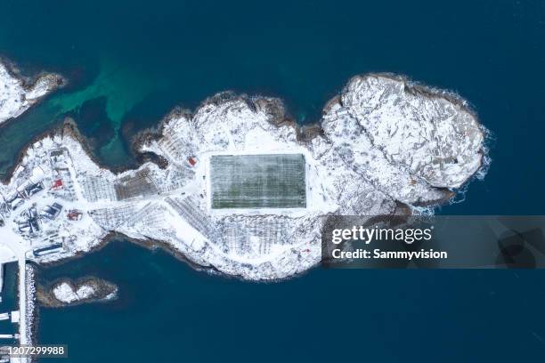 high angle view of soccer field in henningsvaer - henningsvaer stock pictures, royalty-free photos & images