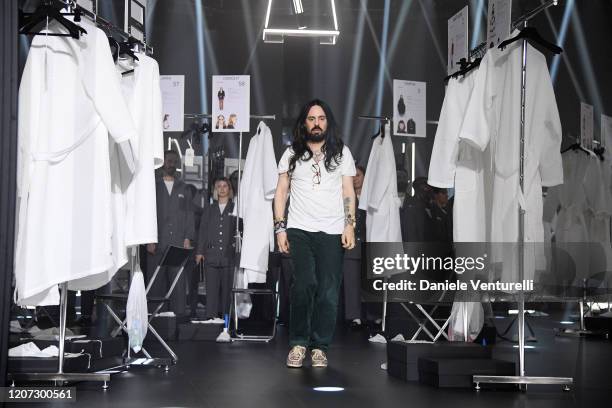 Fashion Designer Alessandro Michele acknowledges the appause of the audience during the Gucci Fall/Winter 2020/21 fashion show during Milan Fashion...