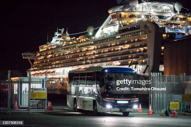 Bus carrying passengers who will take the flight chartered by the government of the Hong Kong Special Administrative Region of the People's Republic...