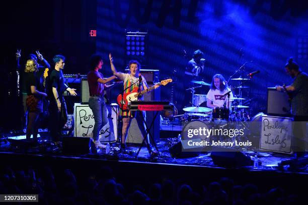 Braeden Lemasters, Dylan Minnette and Cole Preston of Wallows surprised Jack Sowton with a birthday cake during Becky Redford, Lily Wolter, Jack...