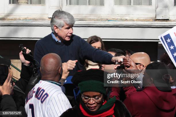 Former Illinois Governor Rod Blagojevich greets people gathered in front of his home as he steps out to address the press on February 19, 2020 in...