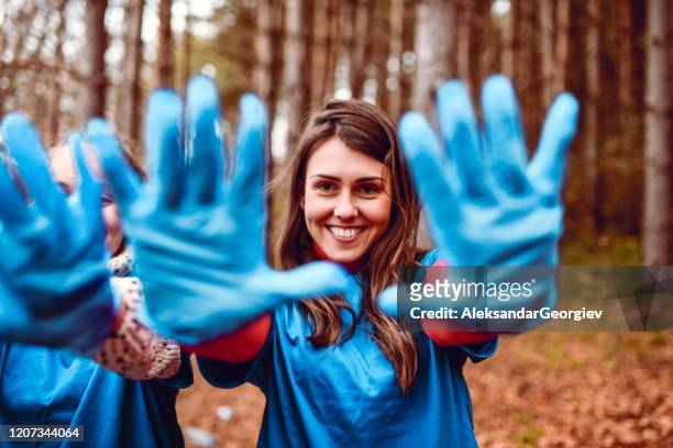 this are our gloves after working in the local park - macedonia country stock pictures, royalty-free photos & images