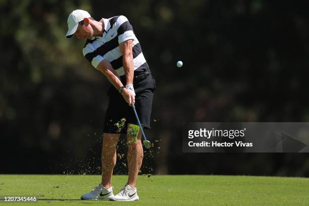 Rory McIlroy of Northern Ireland plays a shot on the 6th hole ahead of World Golf Championships-Mexico Championship at Club de Golf Chapultepec on...
