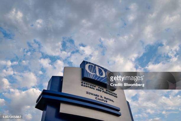 Signage stands outside the Centers for Disease Control and Prevention headquarters in Atlanta, Georgia, U.S, on Saturday, March 14, 2020. As the...