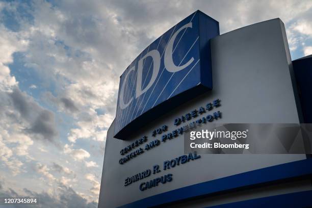 Signage stands outside the Centers for Disease Control and Prevention headquarters in Atlanta, Georgia, U.S, on Saturday, March 14, 2020. As the...