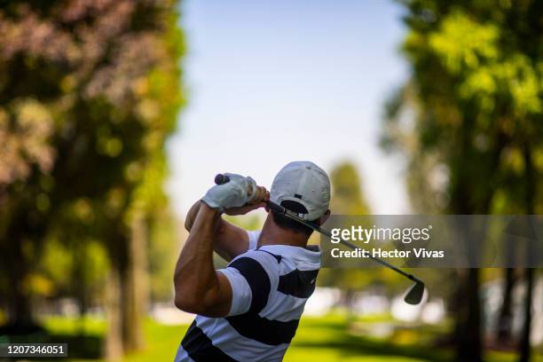 Rory McIlroy of Northern Ireland plays his shot from the 7th tee ahead of World Golf Championships-Mexico Championship at Club de Golf Chapultepec on...