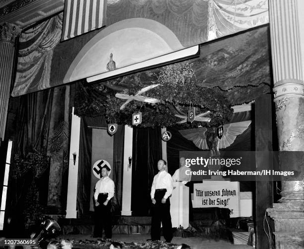 General view of the German American Bund party during a meeting with a message in German saying, "Mit unseren fahnen ist der sieg" which means "with...
