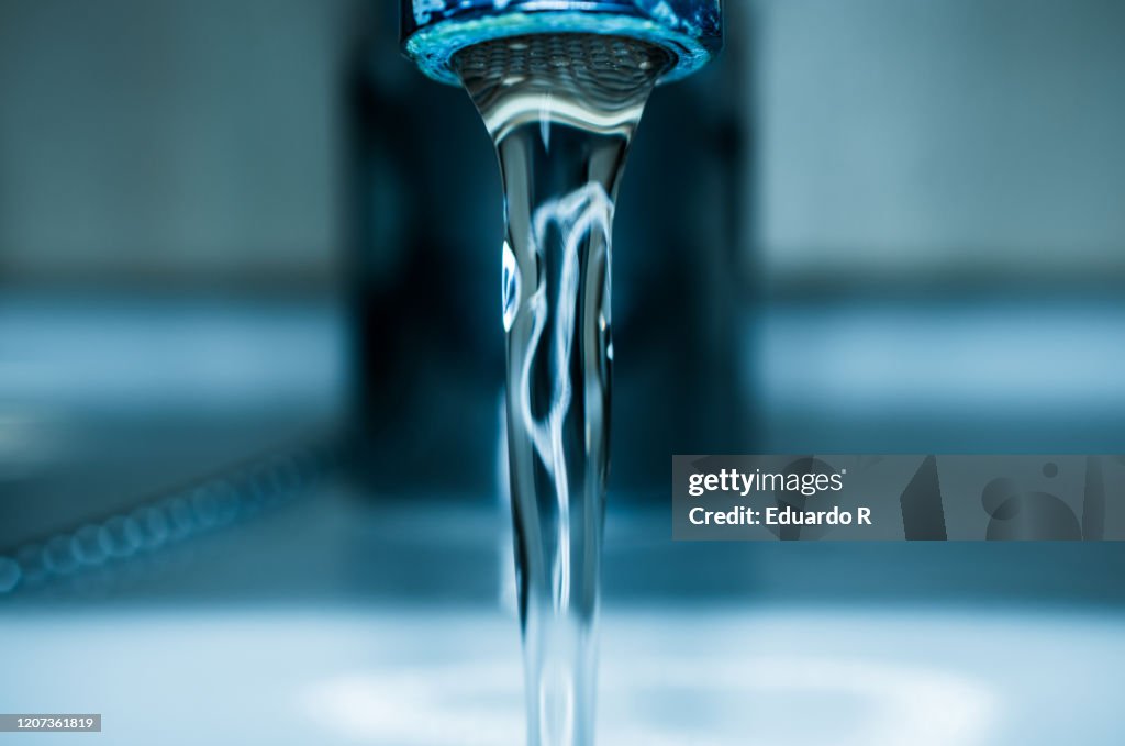 Water coming out of a tap