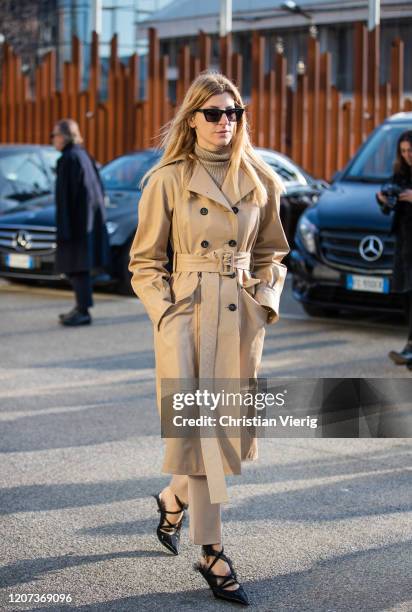 Ada Kokosar is seen wearing camel trench coat outside Alberta Ferretti during Milan Fashion Week Fall/Winter 2020-2021 on February 19, 2020 in Milan,...