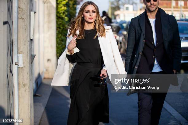 Olivia Palermo is seen wearing black dress, white blazer and Johannes Huebl outside Alberta Ferretti during Milan Fashion Week Fall/Winter 2020-2021...