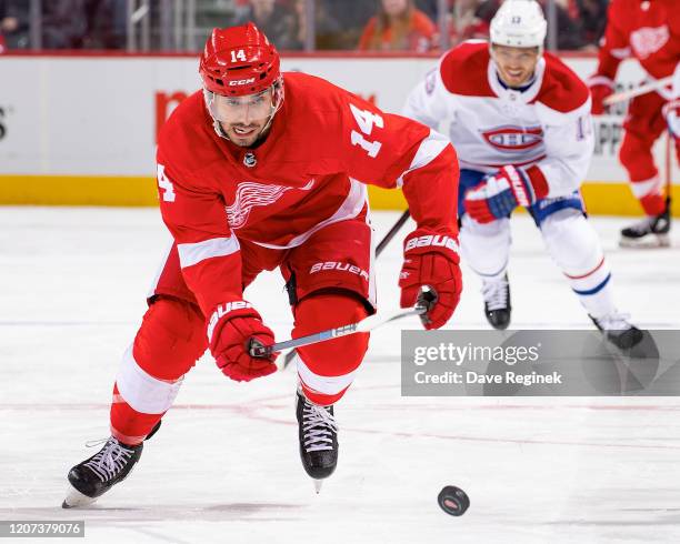 Robby Fabbri of the Detroit Red Wings skates after a loose puck against the Montreal Canadiens during an NHL game at Little Caesars Arena on February...