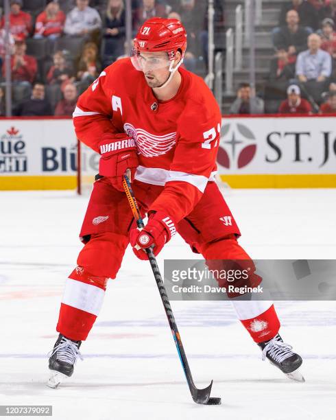 Dylan Larkin of the Detroit Red Wings controls the puck against the Montreal Canadiens during an NHL game at Little Caesars Arena on February 18,...