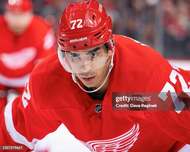 Andreas Athanasiou of the Detroit Red Wings gets set for the face-off against the Montreal Canadiens during an NHL game at Little Caesars Arena on...