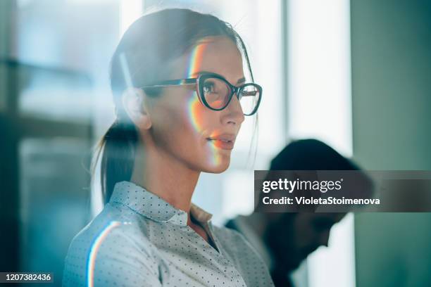 portrait of a successful businesswoman - prism stock pictures, royalty-free photos & images