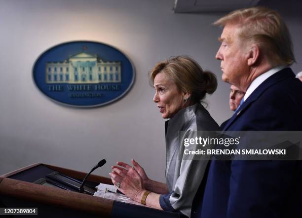 Coronavirus Response Coordinator Dr. Deborah Birx speaks as US President Donald Trump looks on during a press briefing at the White House in...