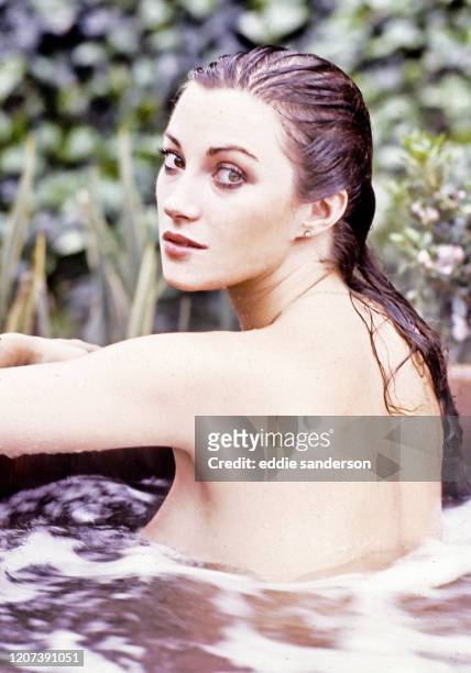 British-American actress Jane Seymour OBE in her hot tub at her Hollywood Hills, California home in March 1979. .