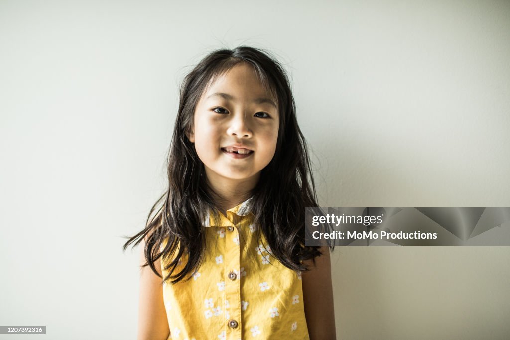 Portrait of young girls (6 yrs) in bedroom at home
