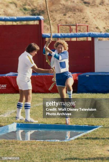 Penny Marshall competing in the track and field competition on the ABC tv series 'Battle of the Network Stars II'.