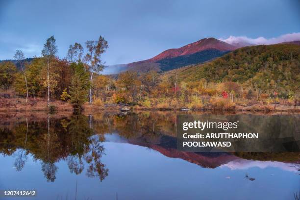 norikura hightland mountain and forest changed color in aumtumn time at nagano , japan - 岩手山 ストックフォトと画像