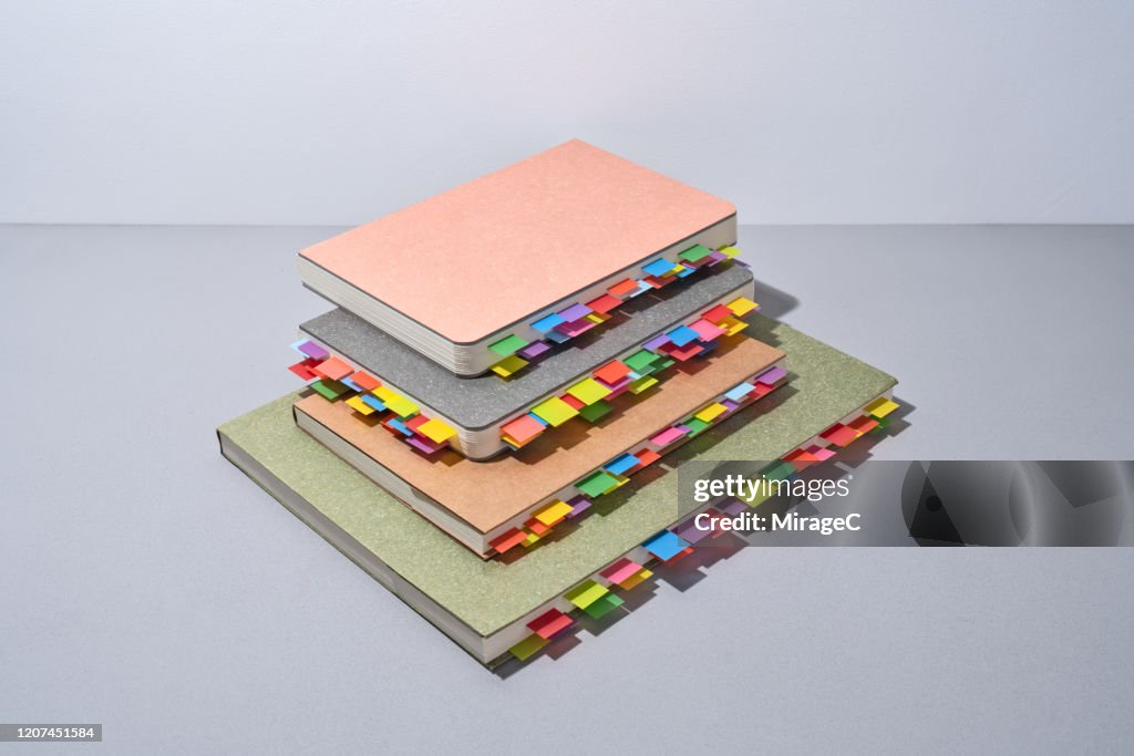 Abundance of Colorful Bookmarks on Note Pads