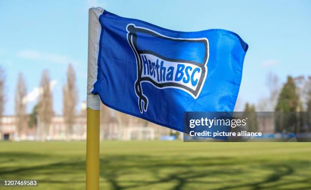 March 2020, Berlin: Football: Hertha BSC, abandoned training ground of Hertha BSC. Flag waving on sideline in the wind. Hertha BSC has placed a...