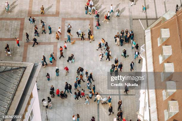aerial view of marienplatz square with people in munich, germany - upper bavaria stock pictures, royalty-free photos & images
