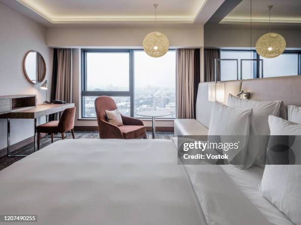 standard hotel room in a luxury hotel in moscow - panoramic room stock pictures, royalty-free photos & images