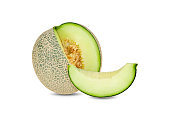 whole and sliced green melon on white background