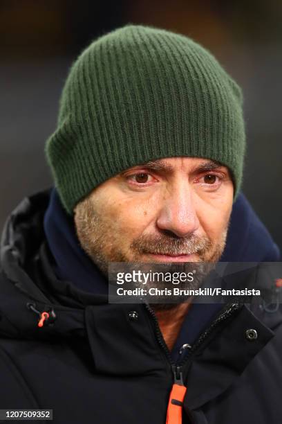 Christophe Dugarry looks on during the UEFA Champions League round of 16 first leg match between Borussia Dortmund and Paris Saint-Germain at Signal...