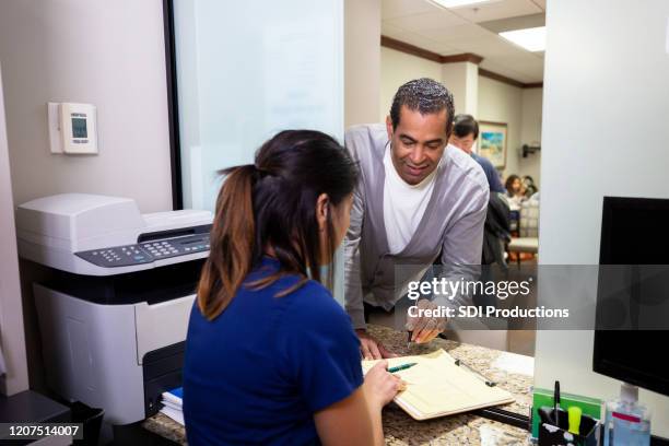 Doctors Reception Window 40 Doctor Reception Window Stock Photos, High-Res Pictures, and Images ...