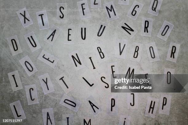 typography letters over black background - una palabra fotografías e imágenes de stock