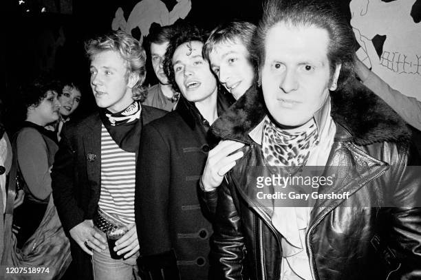 View of members of English New Wave group Adam and the Ants at the Mudd Club, New York, New York, April 1, 1981. Pictured are Gary Tibbs , Terry Lee...