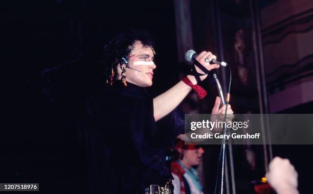 English New Wave musician Adam Ant , of the group Adam and the Ants, performs onstage at the Ritz, New York, New York, April 8, 1981. Visible in the...