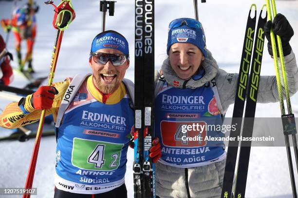 Franziska Preuss of Germany an her team mate Erik Lesser celebrate after the Single Mixed Relay at the IBU World Championships Biathlon...