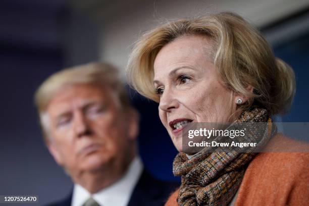 President Donald Trump looks on as White House Coronavirus Response Coordinator Dr. Deborah Birx speaks about the coronavirus outbreak in the press...