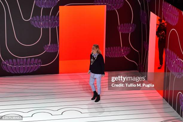 Fashion designer Miuccia Prada acknowledges the applause of the audience during the Prada fashion show as part of Milan Fashion Week Fall/Winter...